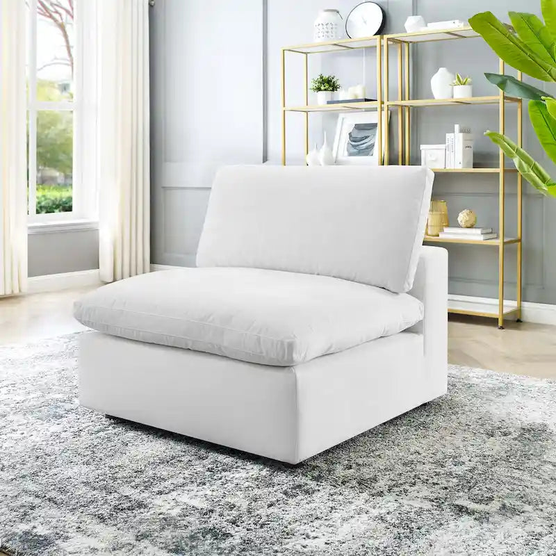 Fauteuil sans accoudoirs en velours haute performance garni de duvet et surpiqué