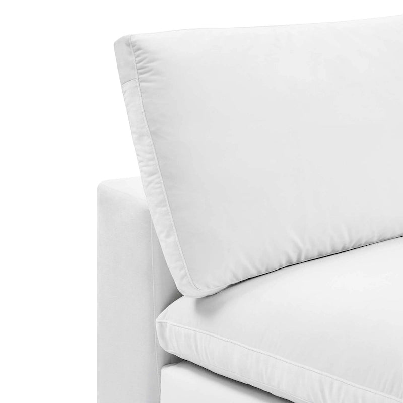 Fauteuil sans accoudoirs en velours haute performance garni de duvet et surpiqué