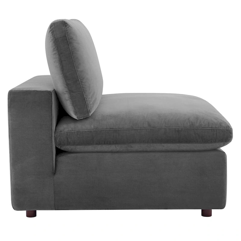 Fauteuil sans accoudoirs en velours haute performance garni de duvet et surpiqué