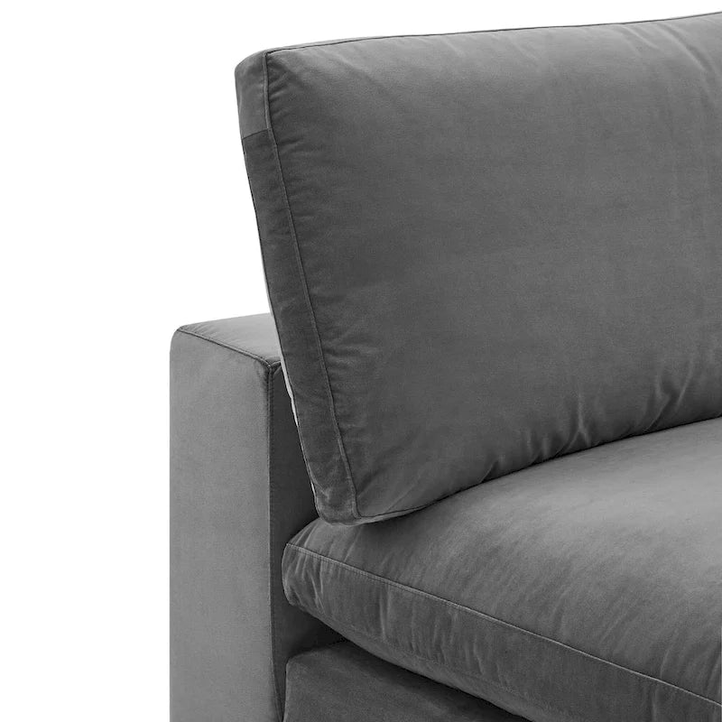 Fauteuil sans accoudoirs en velours haute performance garni de duvet et surpiqué