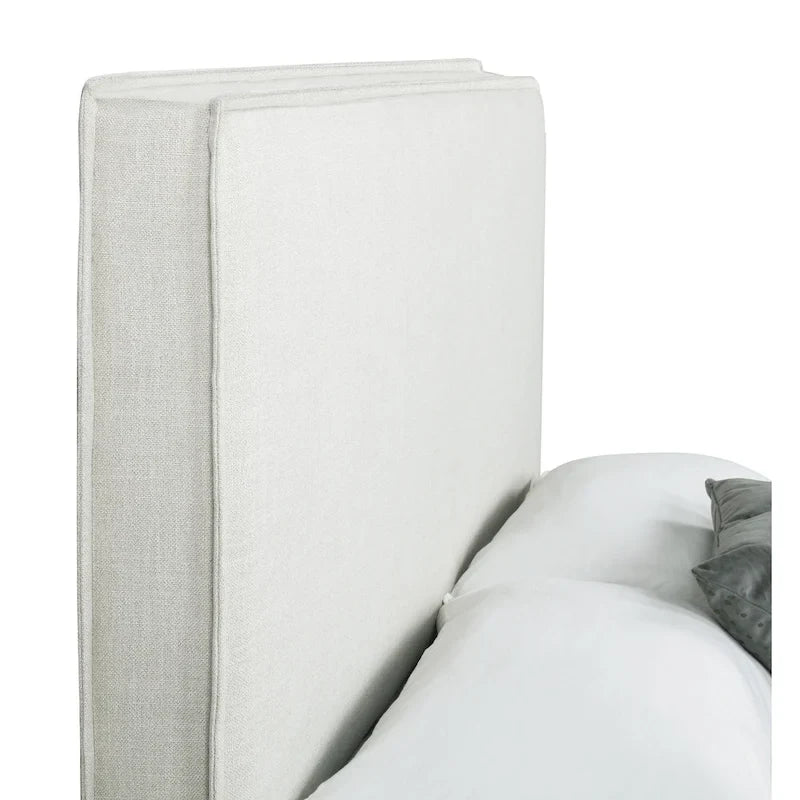 Tête de lit rembourrée avec détails à bride