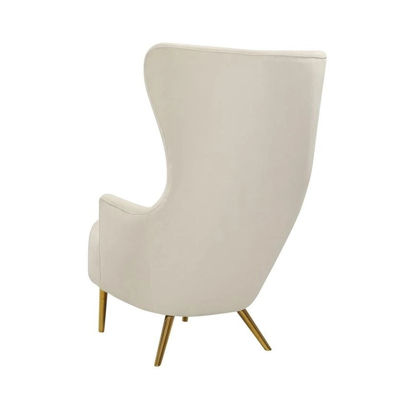 Fauteuil club en velours couleur crème