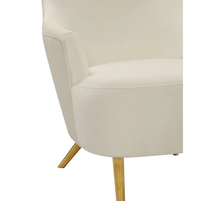 Fauteuil club en velours couleur crème